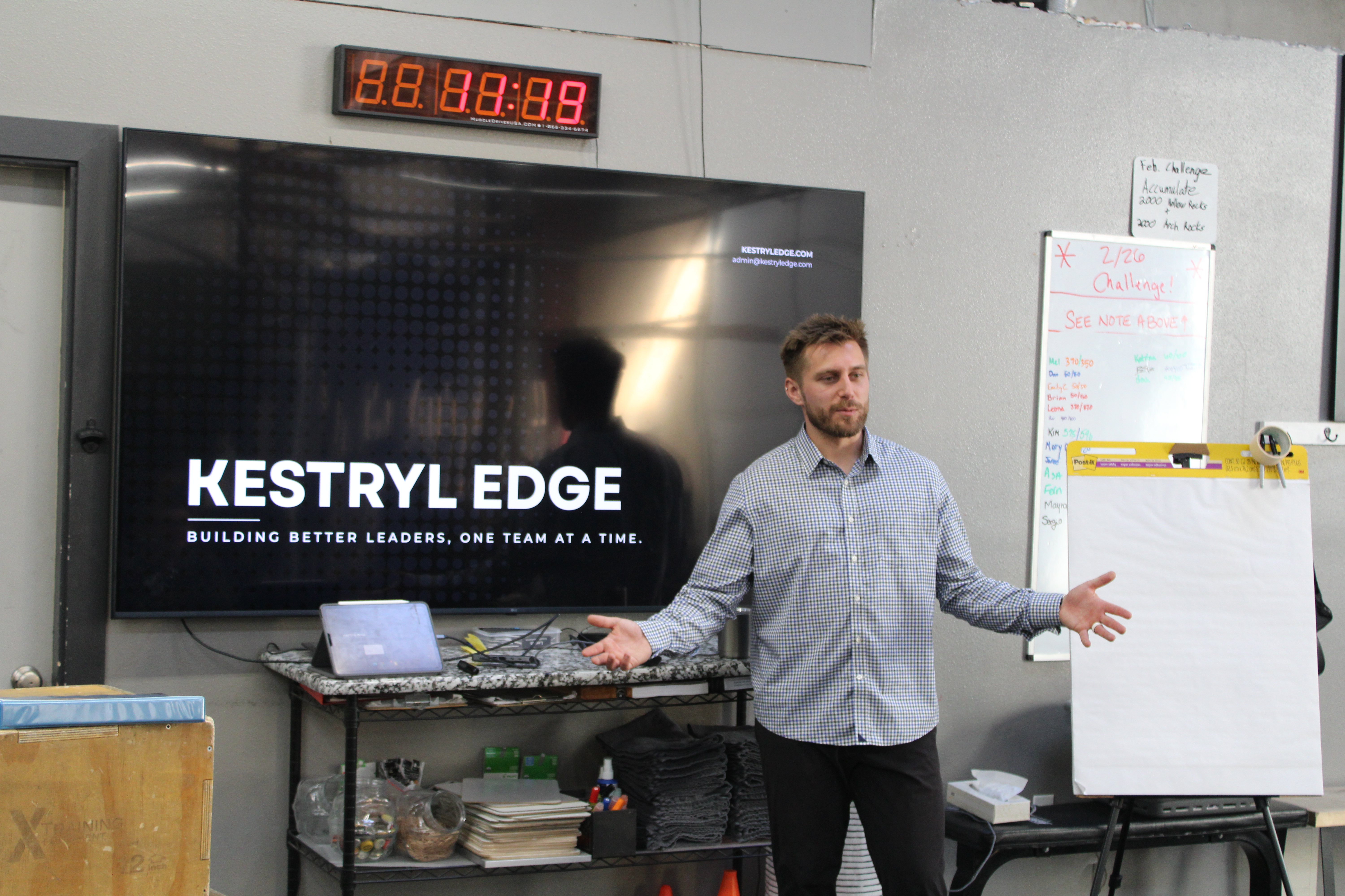 Dan Korus presenting in front of the Kestryl Edge brand screen
